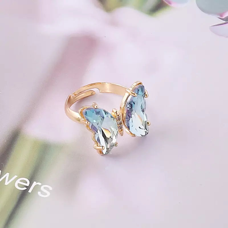 | Adjustable Gold-plated Sky Blue Crystal Butterfly RingAfrican and Caribbean inspired by Jewellery and accessories | African Jewellery | Caribbean jewellery | Afro-Caribbean accessories | African jewelry